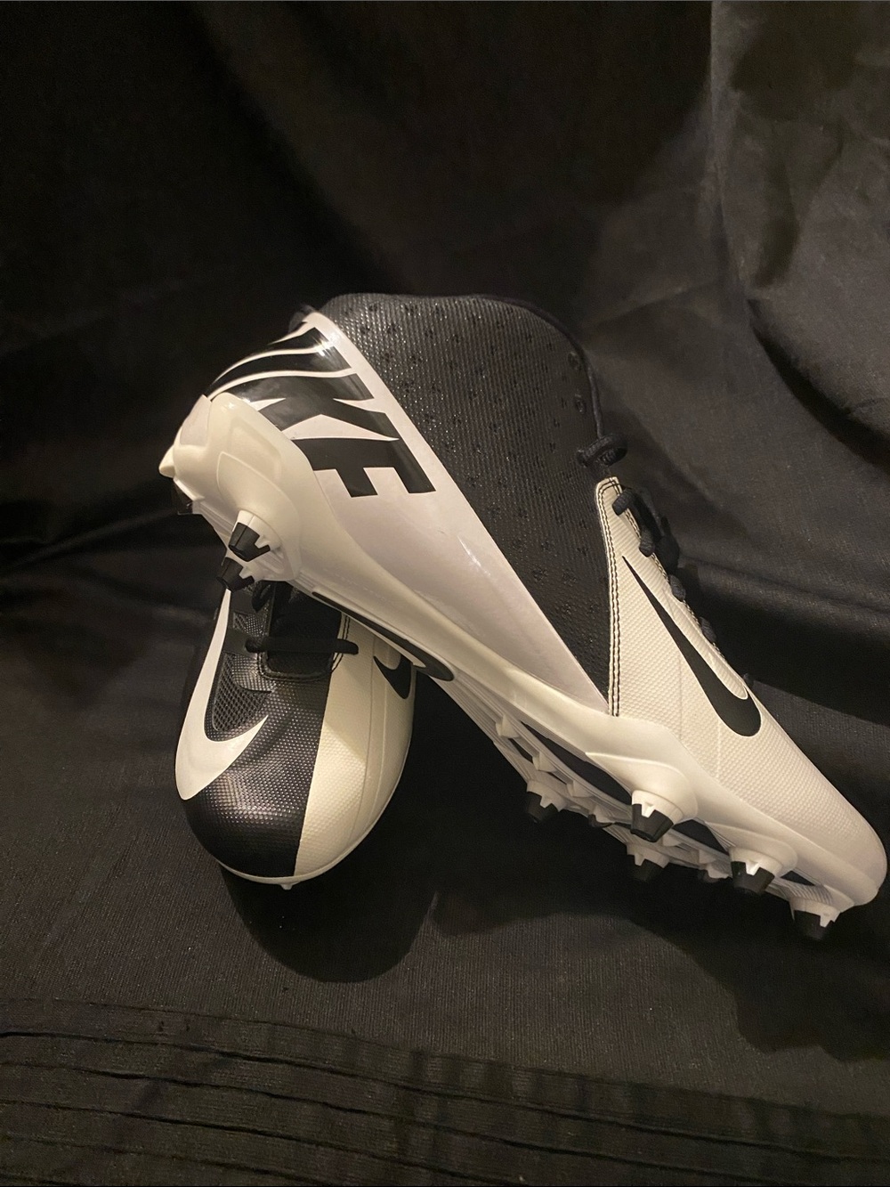 Nike Black and White Soccer Cleats with Bold Swoosh